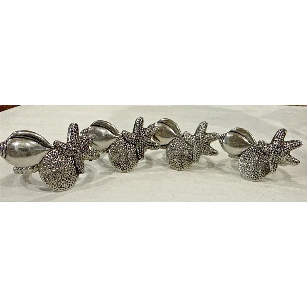 vintage silver-toned napkin rings Figuring Seashells